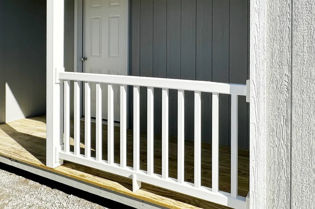 Shed porch railing featuring K-Rail Vinyl railings